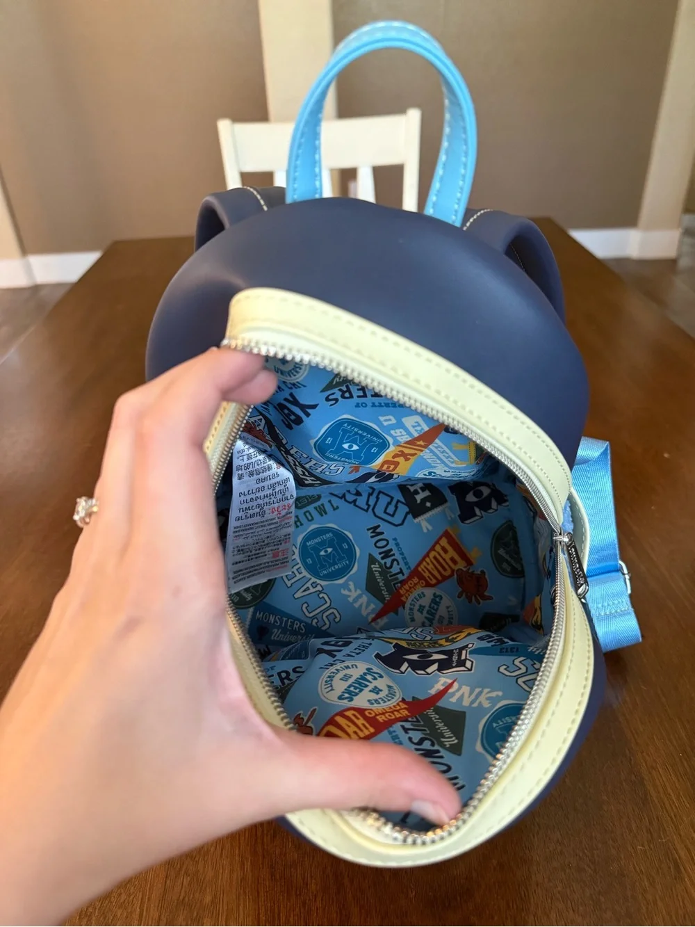Loungefly Disney Parks Monsters University Varsity Jacket Mini Backpack